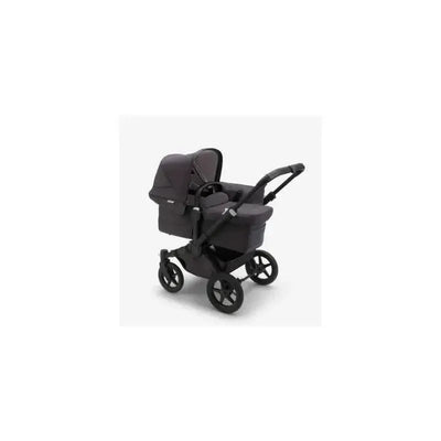 Bugaboo Donkey 5 Mineral Mono stroller in black and washed black, featuring a spacious seat and carrying capacity.