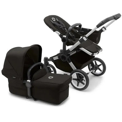 Bugaboo Donkey 5 Mono stroller in aluminum and midnight black, featuring a reversible seat and a bassinet attachment.