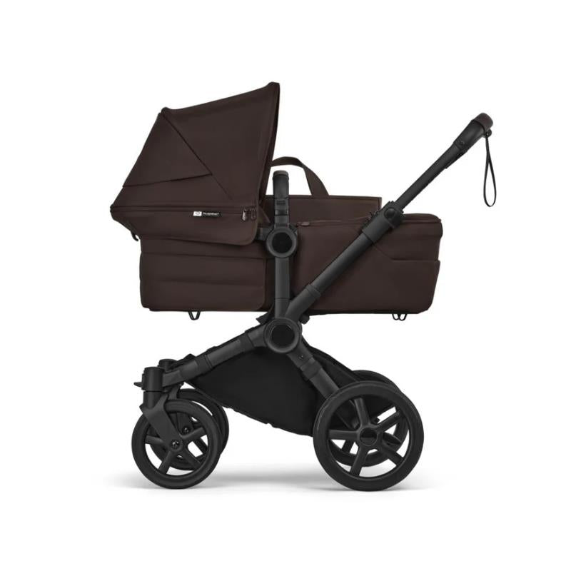 Bugaboo Donkey 6 Complete Stroller in Black with Cocoa Brown fabric, featuring a bassinet and spacious seating.
