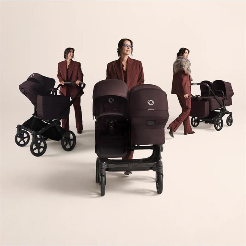 Bugaboo Donkey 6 Complete Stroller in Black/Cocoa Brown showcased with models in stylish attire, highlighting versatility and design.
