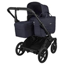 Bugaboo Donkey 6 Complete Stroller in Black and Deep Indigo, featuring a spacious bassinet and a large storage basket underneath.