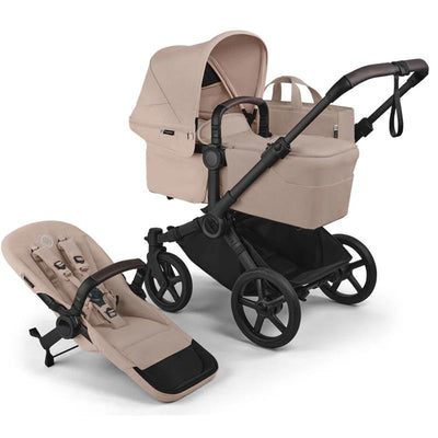Bugaboo Donkey 6 Complete Stroller in Black/Desert Taupe Melange, featuring a carrycot and a reclining seat, both in a soft taupe fabric.