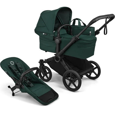 Complete Bugaboo Donkey 6 stroller in black and fern green, featuring a bassinet, a removable seat, and a storage basket.