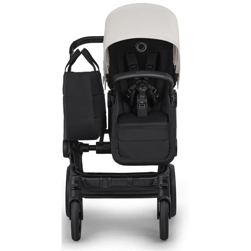 Bugaboo Donkey 6 Complete Stroller in Black/Heritage Black, featuring a beige canopy, adjustable harness, and storage bag.