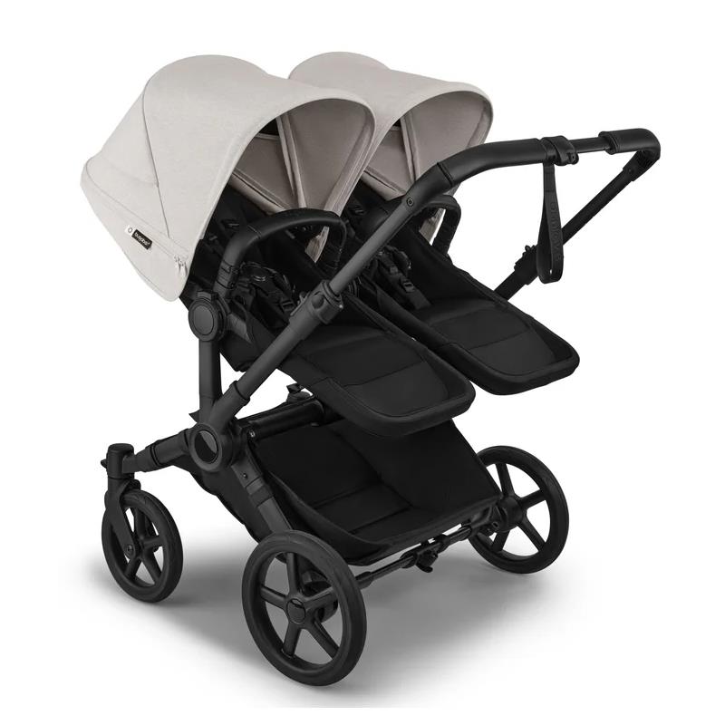Bugaboo Donkey 6 Complete Stroller in black and heritage black, features two seats with matching canopies and a modern design.