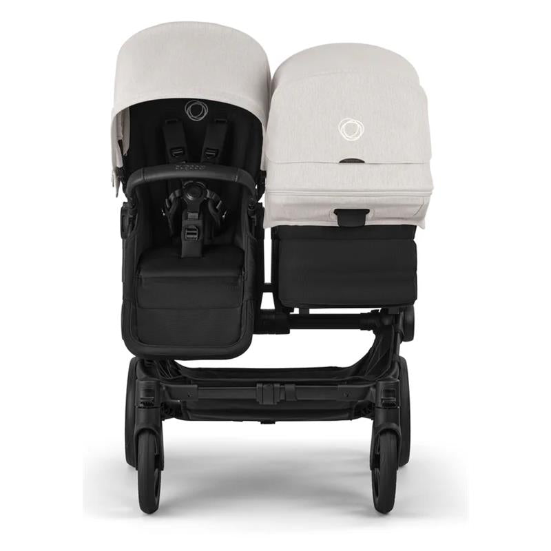 Bugaboo Donkey 6 Complete Stroller in Black/Heritage Black with two seats and large sun canopies.