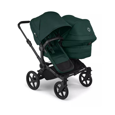 Bugaboo Donkey 6 sibling seat in Fern Green with two canopies, designed for two children, featuring a black frame and wheels.