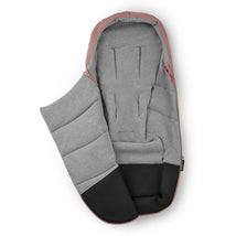 Bugaboo Footmuff in Dusty Pink with a soft gray interior and black bottom, designed for keeping infants warm.