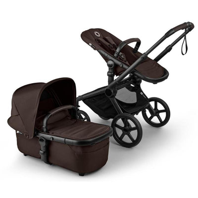 Bugaboo Fox 5 Renew Complete Bassinet & Seat in Black/Cocoa Brown, featuring a reclining seat and a sturdy base with large wheels.