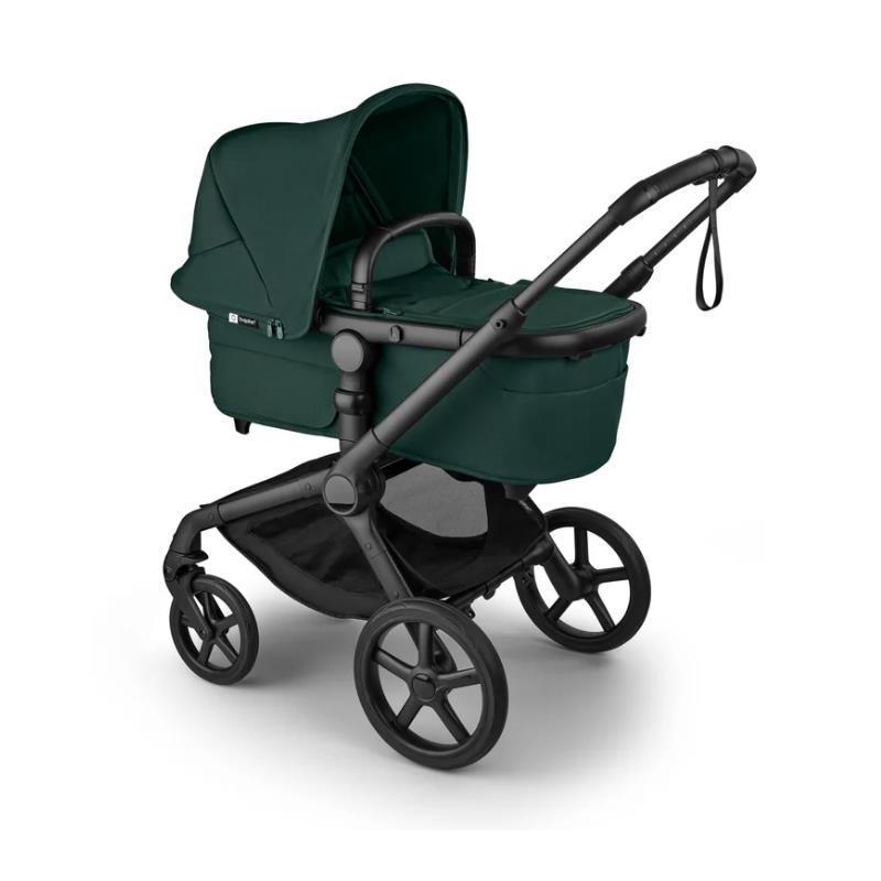 Bugaboo Fox 5 Renew Complete Bassinet & Seat in Black and Fern Green, featuring a sleek design and sturdy wheels.