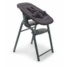 Bugaboo Giraffe Newborn Set in Tornado Grey, featuring a high chair with padded seat and safety harness.
