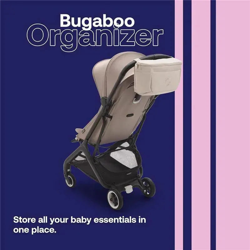 Bugaboo Organizer in Desert Taupe attached to a stroller, designed to store baby essentials neatly.
