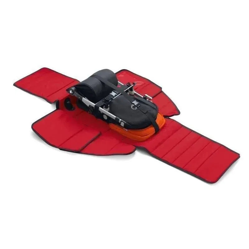 Universal Comfort Transport Bag by Bugaboo, featuring a black and orange interior with a padded red exterior for protection.