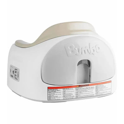 Taupe Bumbo 3-in-1 Multi Seat with adjustable height, featuring warning label at the base for safety information.