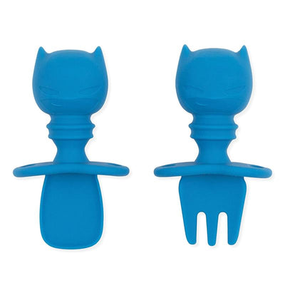 Silicone baby utensils set in blue, featuring a spoon and fork with a Batman-themed design.