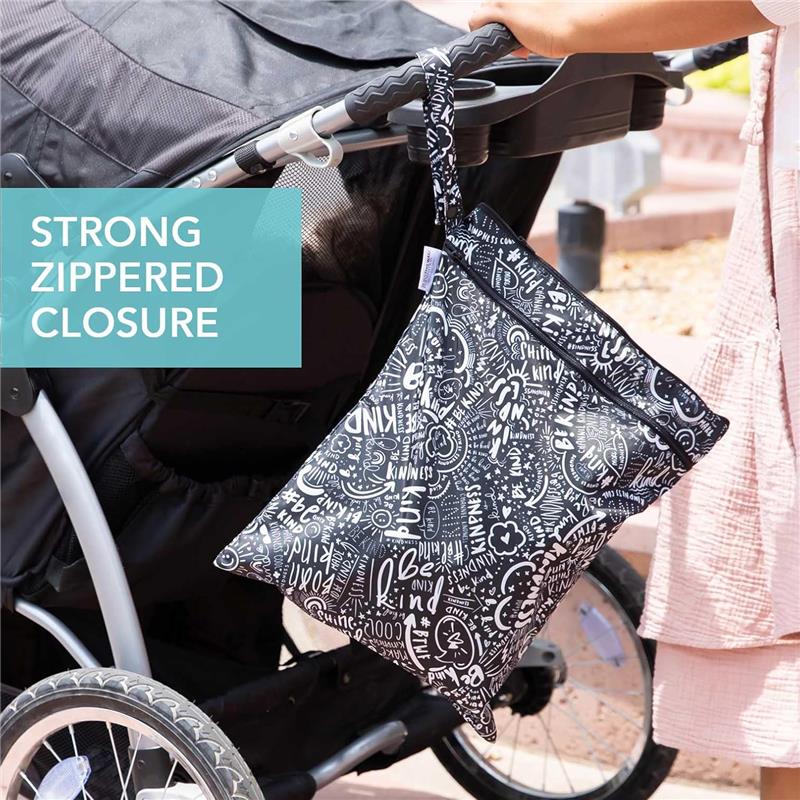 Bumkins Born This Way Foundation Wet/Dry Bag with a strong zippered closure, featuring a black design with white positive phrases, hanging on a stroller.