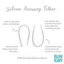 Gray silicone accessory tether by Bumkins, featuring suction cup for surfaces and loops for securing items to prevent dropping.