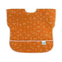 Junior bib by Bumkins in an orange color with white arrow patterns, featuring a pocket at the bottom.