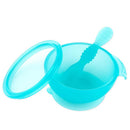 Bumkins silicone feeding set in blue jelly, featuring a suction bowl and matching spoon.