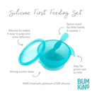Silicone feeding set for babies and toddlers in blue; includes a bowl with a lid and a spoon, featuring a strong suction base.