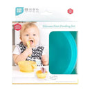 Silicone feeding set by Bumkins featuring a smiling baby holding a yellow spoon, set against a blue background, includes suction base.