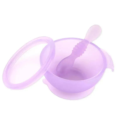 Silicone feeding set for babies and toddlers in purple, including a suction bowl and a matching spoon.