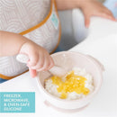 Bumkins Silicone First Feeding Set in sand color, featuring a bowl with food and a spoon, suitable for babies.