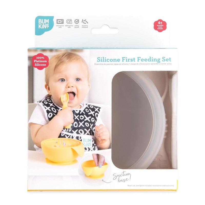 Bumkins Silicone First Feeding Set in sand color, featuring a suction bowl, lid, and spoon, ideal for babies.