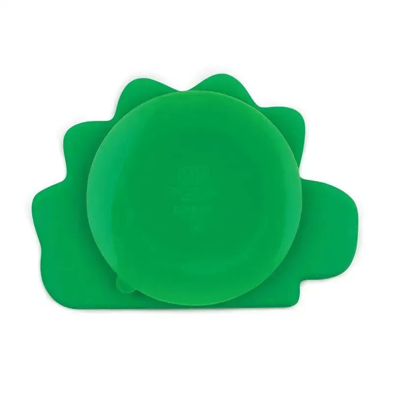 Green silicone grip dish shaped like a dinosaur, designed for children, with a circular bowl and textured edges.