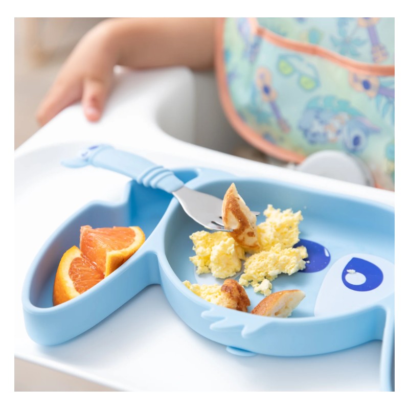 Bumkins Silicone Grip Dish in blue with sections holding scrambled eggs, pancake pieces, and orange wedges, accompanied by a fork.