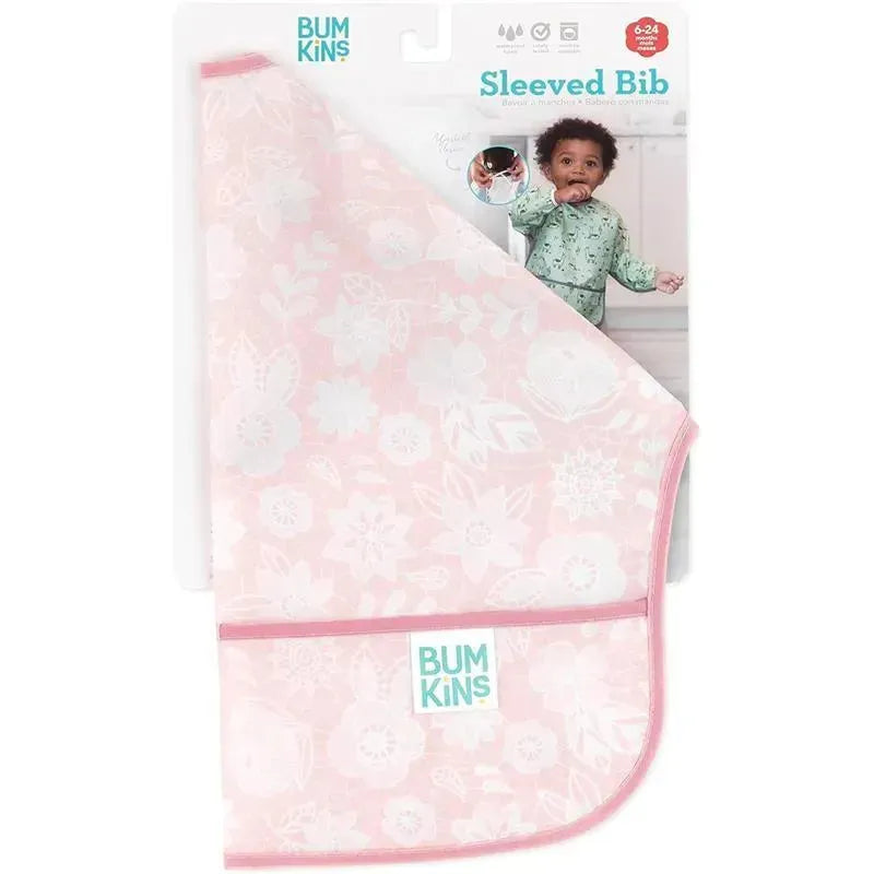 Bumkins Sleeved Bib in pink floral design, suitable for ages 6-24 months, featuring a child-friendly style shown on packaging.