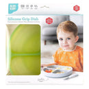 Silicone divided grip dish in green jelly, designed for toddlers, featuring a suction base and a child with a plate of food.