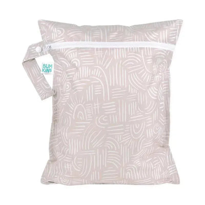 Bumkins Wet Bag in Wander design with a white zip closure, featuring a textured beige pattern and a convenient carry handle.
