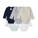 Five pack of unisex long sleeve baby bodysuits in midnight, gray, beige, mint, and white colors with tag labels.