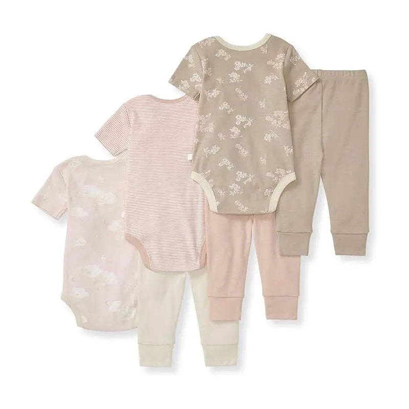 Six organic cotton bodysuits and pants for baby girls in soft colors and floral patterns, ideal for comfortable wear.
