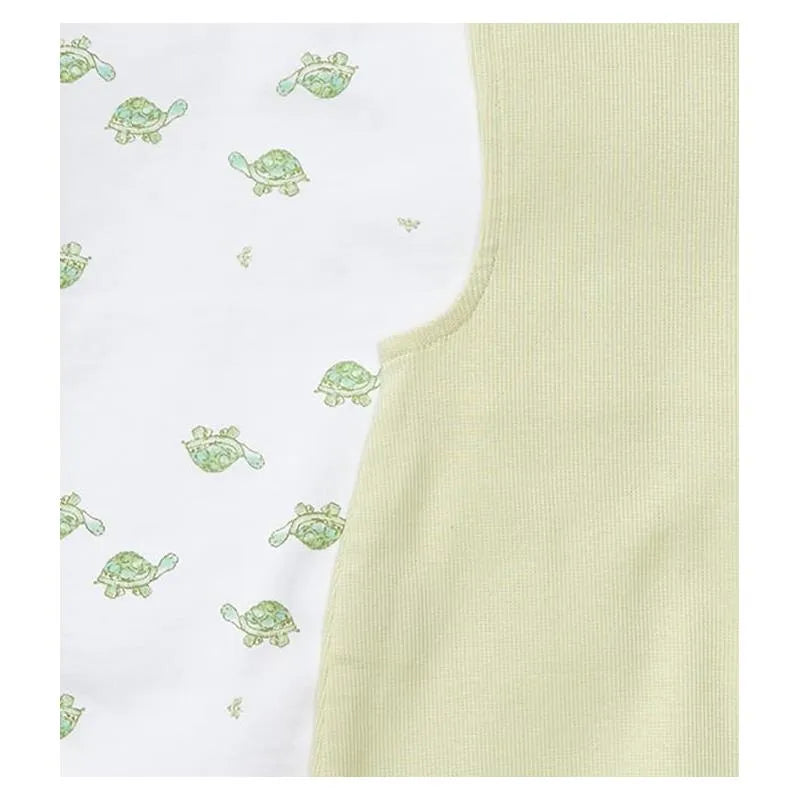 Baby boy jumpsuit and bodysuit set in mint tea color featuring a turtle print on a white background.