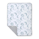 Reversible blanket featuring a moon and crescent pattern in soft gray tones, ideal for cozying up.