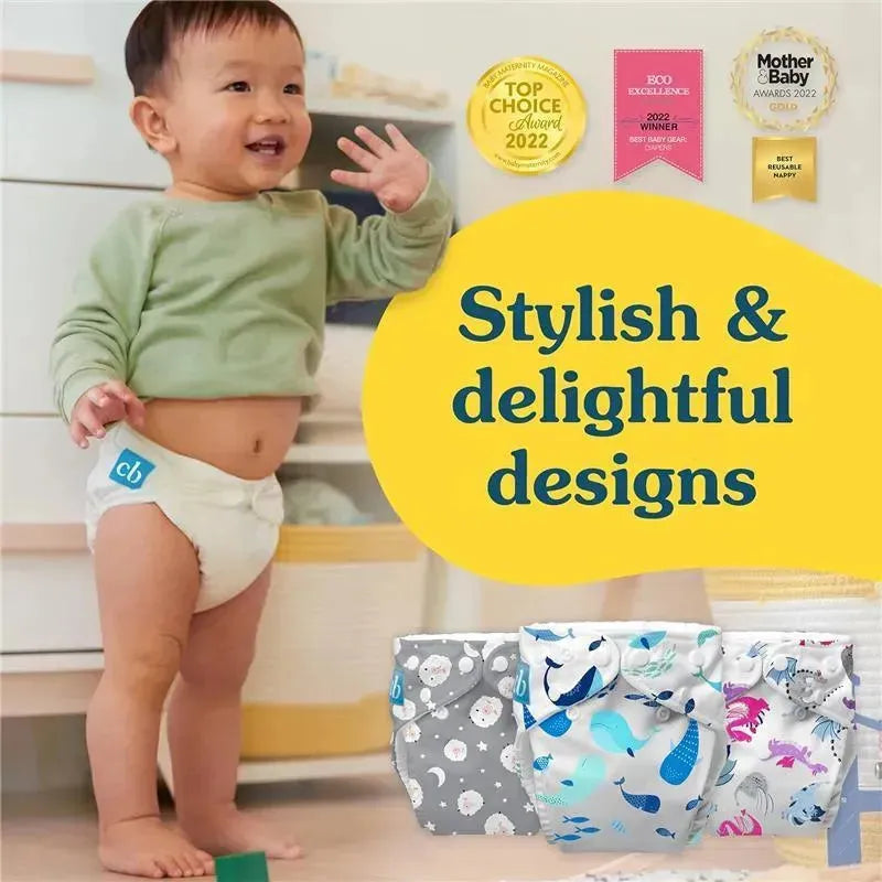Reusable cloth diaper in pencil stripes blue, shown on a smiling child in a light green top, with product awards and designs in the background.