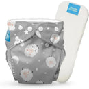 Reusable cloth diaper by Charlie Banana featuring a grey background with sheep and star patterns, includes an adjustable insert.