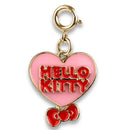 Gold classic Hello Kitty heart charm featuring pink enamel, red lettering, and a red bow at the bottom.