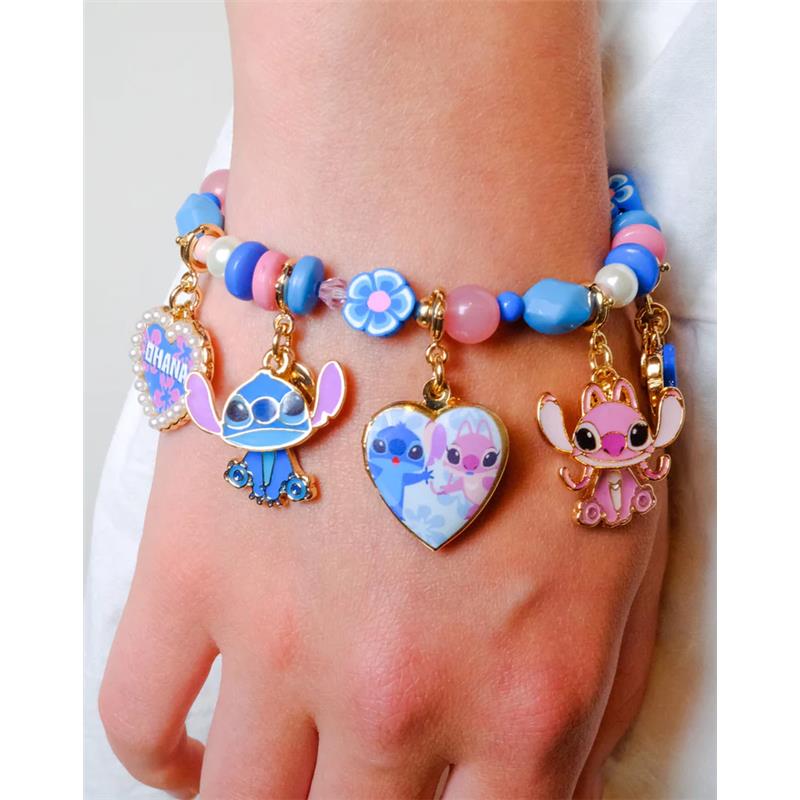 Gold Ohana Pearl Heart bracelet featuring colorful beads and charms of characters Stitch and Angel, emphasizing friendship.