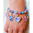 Gold charm bracelet featuring colorful beads and three character charms, including Stitch and a heart design with Stitch and Angel.
