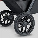 Black wheels of the Chicco Bravo Primo ClearTex Trio Travel System, featuring a stylish design and sturdy construction.
