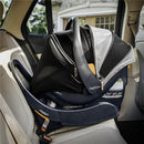 Chicco Bravo Primo ClearTex infant car seat installed in a vehicle, featuring a black and gray canopy and secure base.