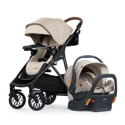Chicco Corso Primo Cleartex Modular Travel System in Hazelnut, featuring a stroller and an infant car seat with a neutral beige fabric.
