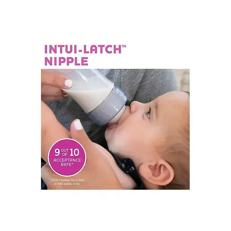 Chicco Intui-Latch baby bottle nipple being used by a baby, with visible text indicating a 9 out of 10 acceptance rate.