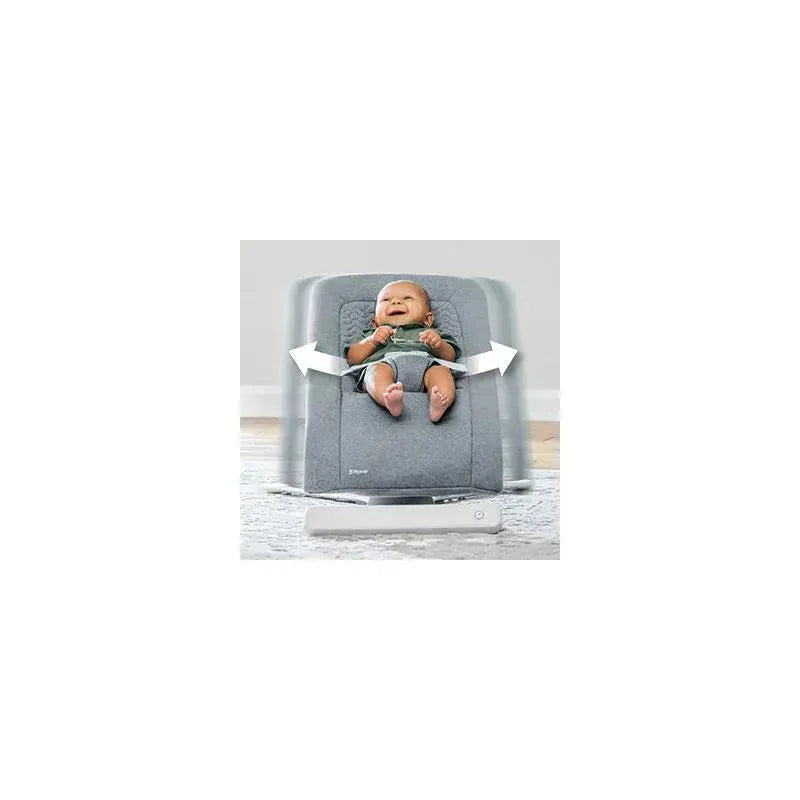 Chicco E-Motion Auto-Glider & Bouncer in grey, featuring a smiling baby secured in a plush seat, gently swaying side to side.
