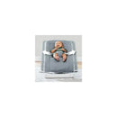 Chicco E-Motion Auto-Glider & Bouncer in grey, featuring a smiling baby secured in a plush seat, gently swaying side to side.