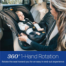 Chicco Fit360 Zip ClearTex Rotating Convertible Car Seat in Jet with a baby and an adult demonstrating ease of use.