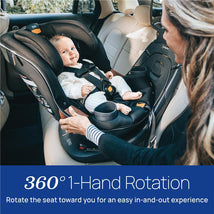 Chicco Fit360 Zip ClearTex Rotating Convertible Car Seat in Jet with a baby and an adult demonstrating ease of use.